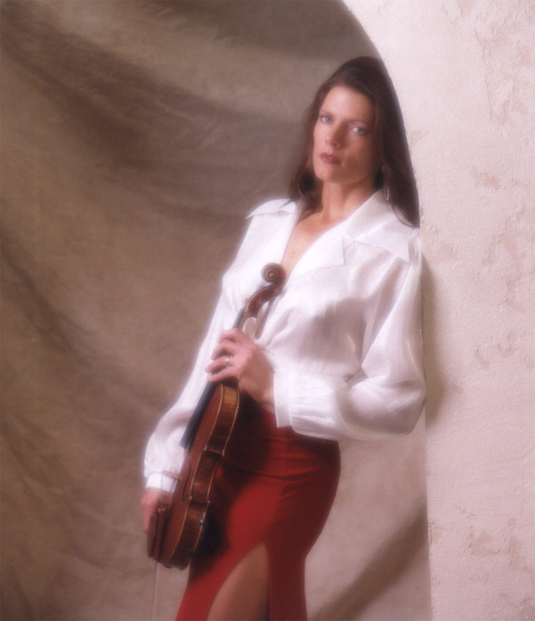 Lynnette Thredgold holding violin
